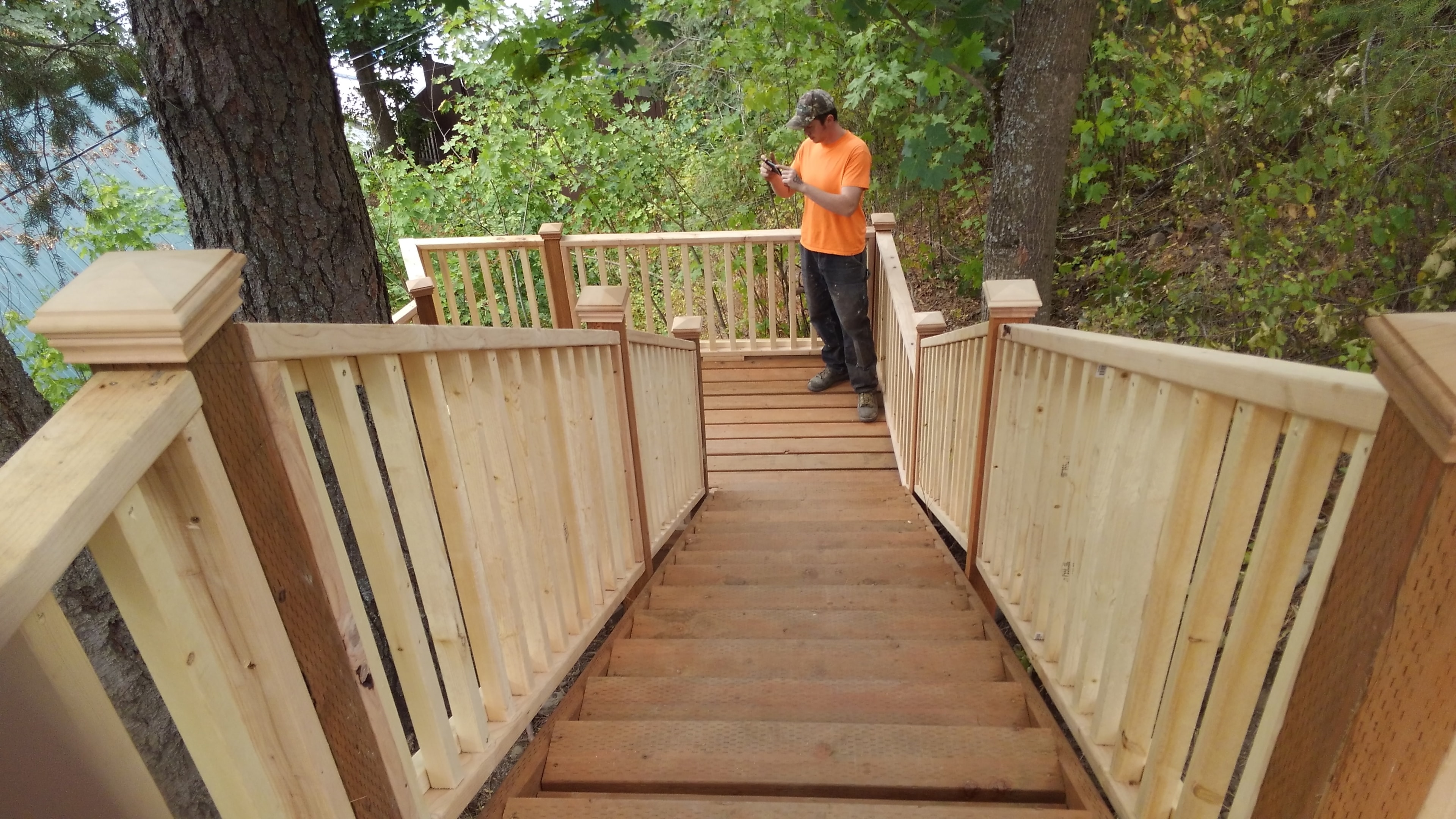 Multi-level cedar stair system with railings