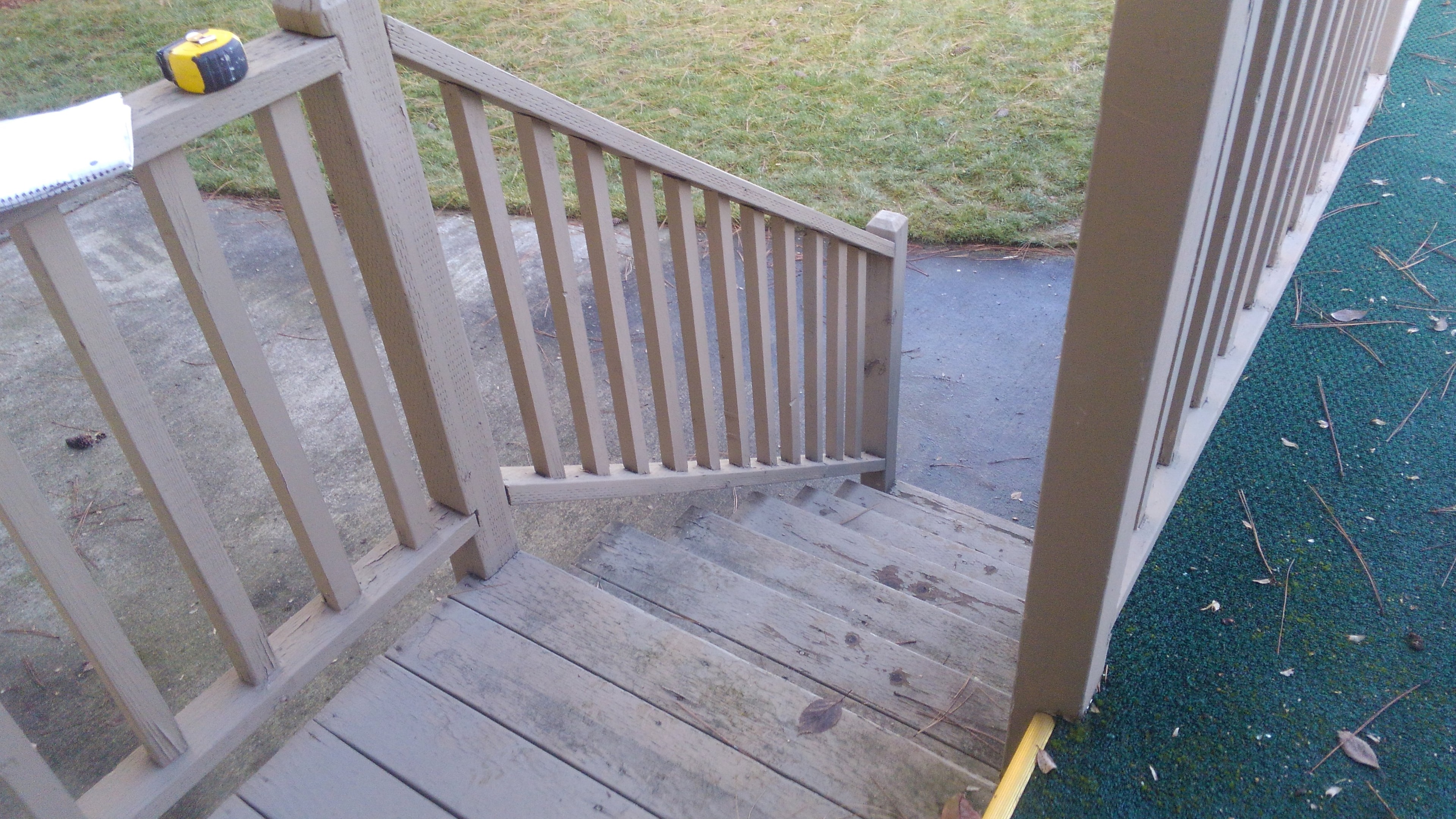 Weathered deck stairs before renovation