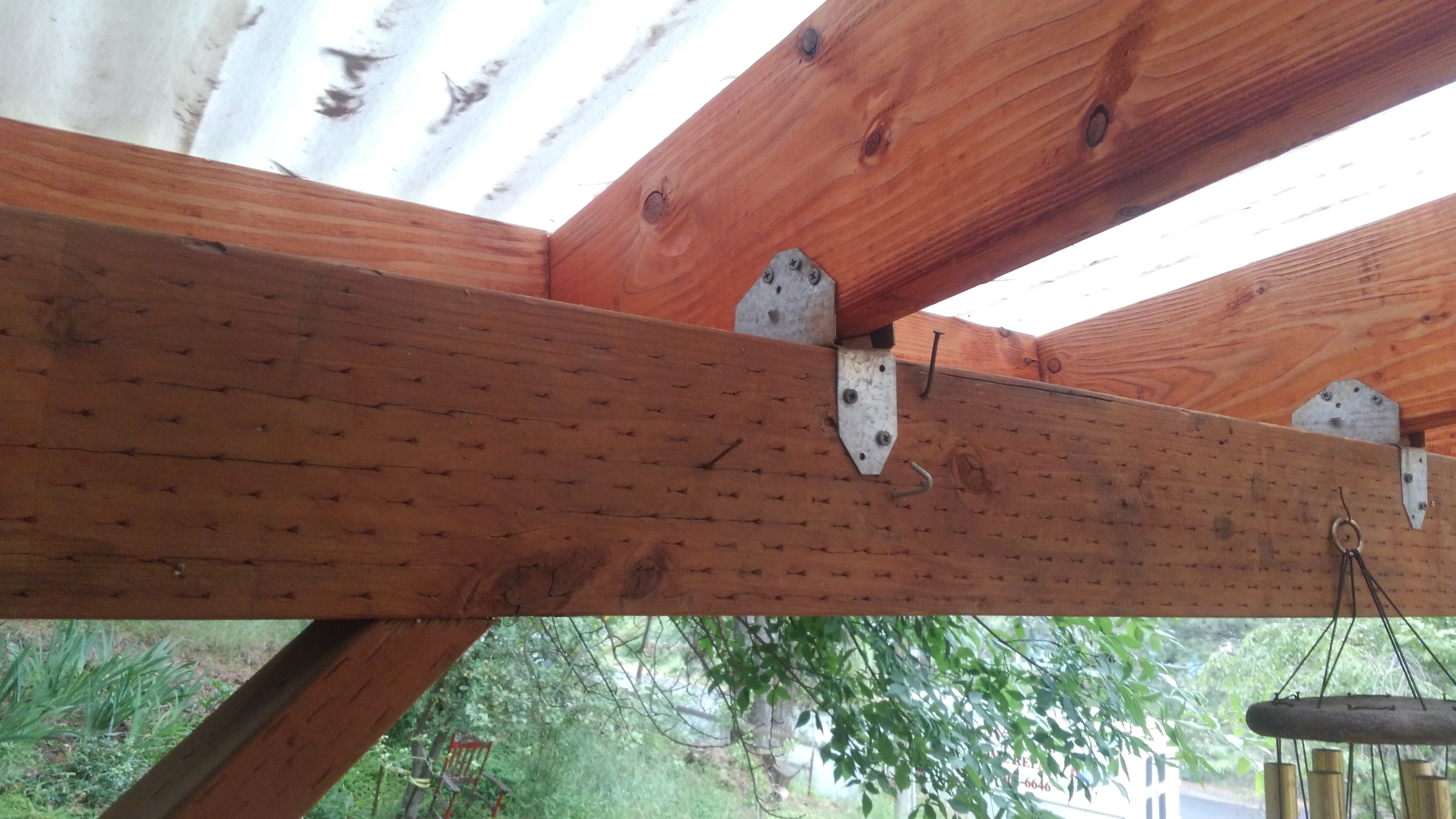 Pergola cedar beam with metal joist hangers