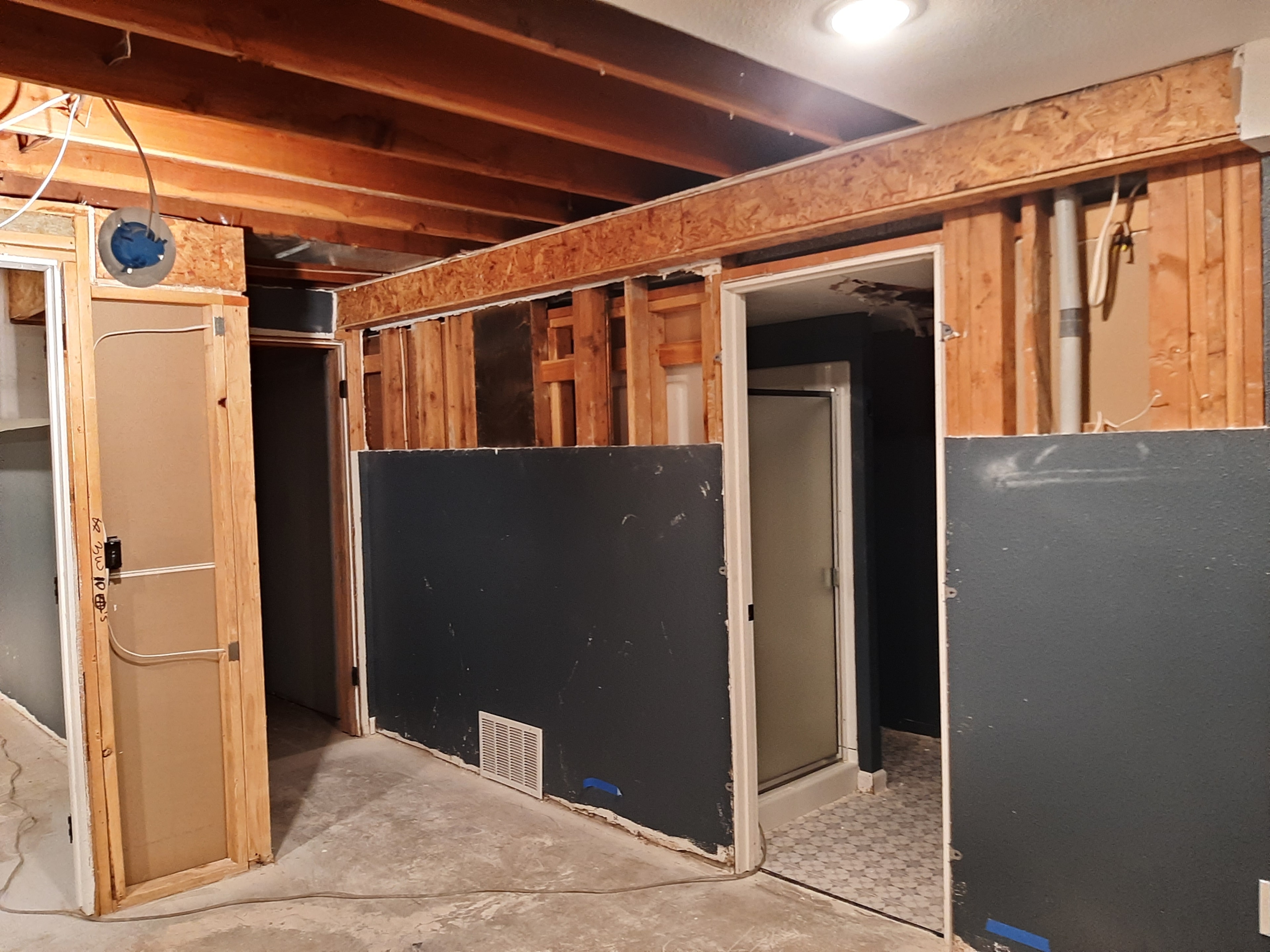 Basement remodel framing with multiple doorways